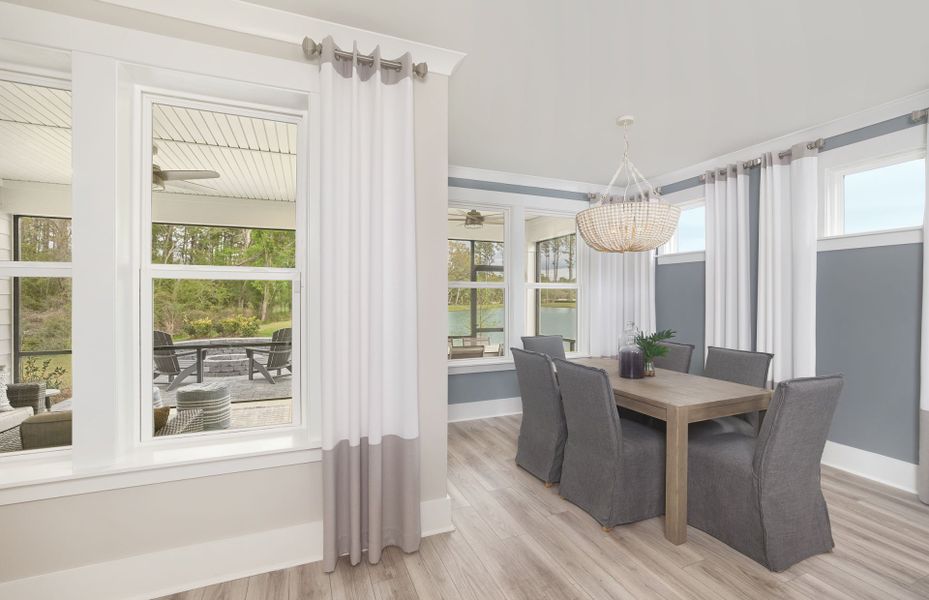 The breakfast cafe leads to the screened porch for alfresco dining