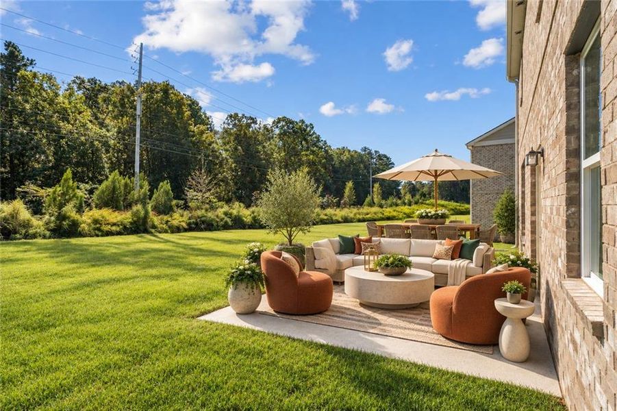 Exterior details and patio area of a home in The Brooke at Rivertown, South Fulton (Image 24).