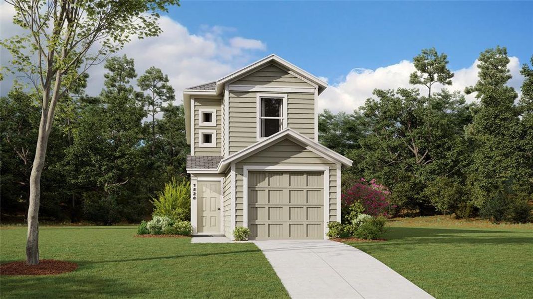 View of front of home featuring a garage and a front yard