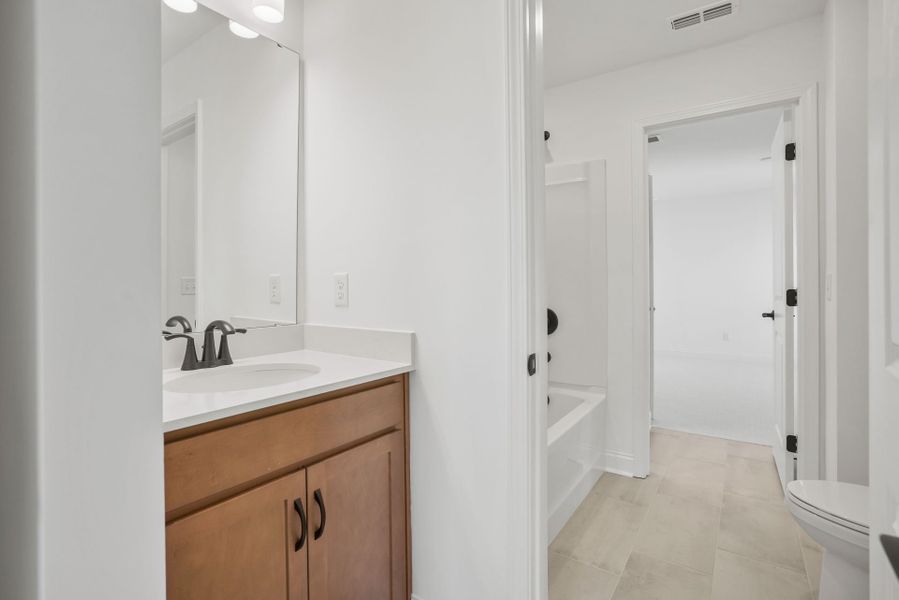 Furnished interior view inside a new home in Forest Creek, Waxhaw (Image 50).