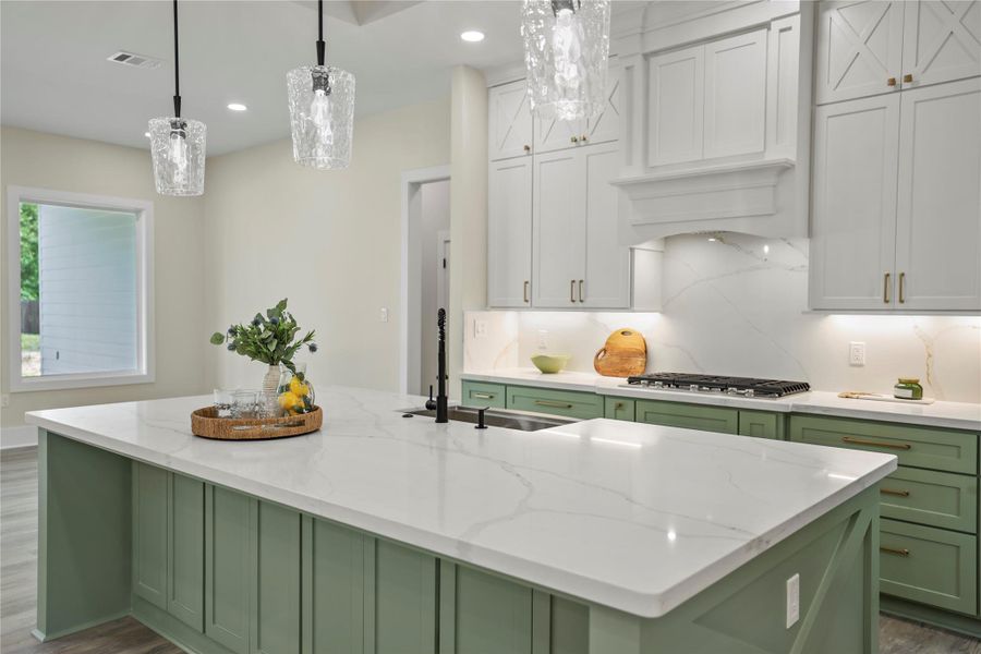 Another View Showcasing the Quartz Counters and Backsplash.