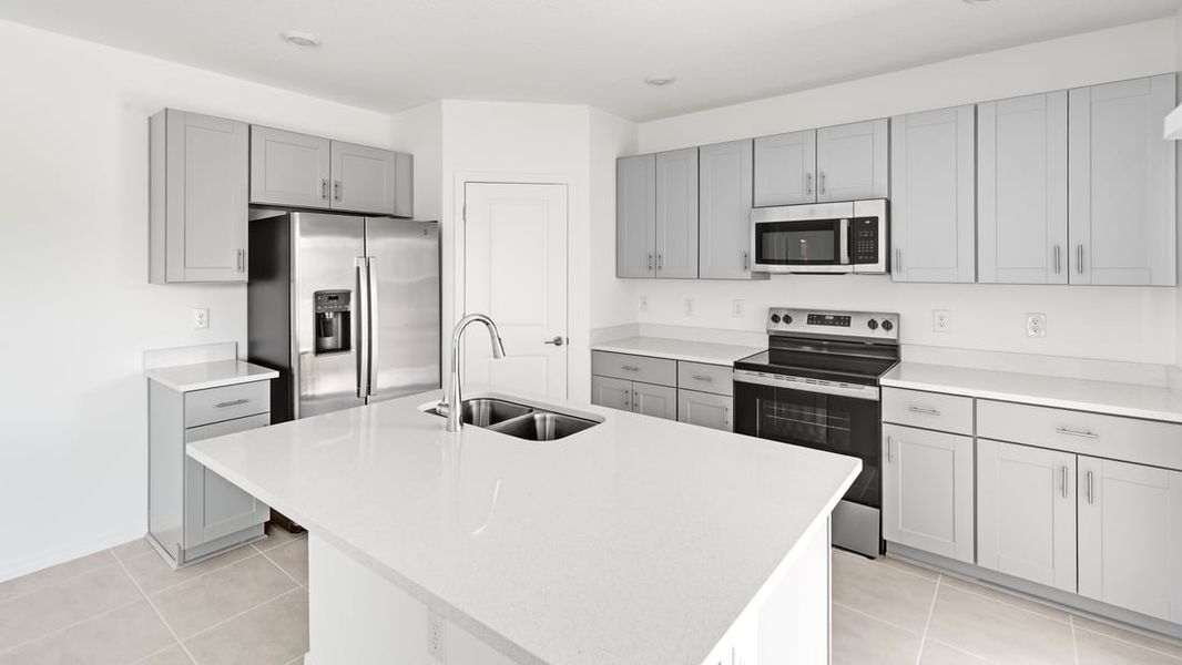 Representative furnished interior of a home built from the Ambrosia by Taylor Morrison in Aden South at Westview, Kissimmee (Image 4).