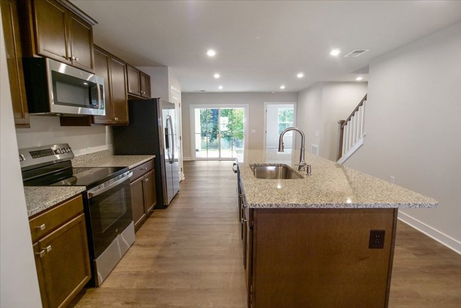 Furnished interior view inside a new home in Arden Woods Villas, Greenville (Image 3).