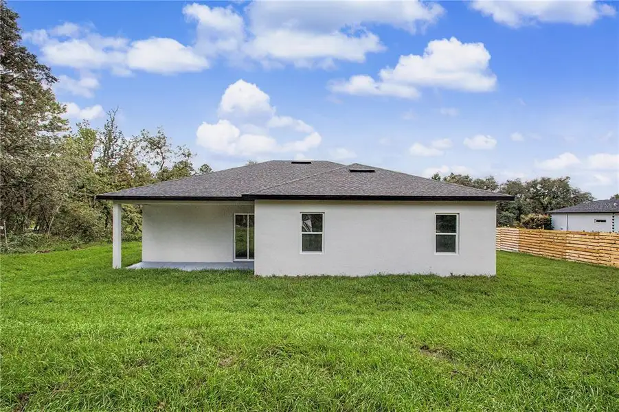 Exterior details and patio area of a home in , Ocala (Image 4).
