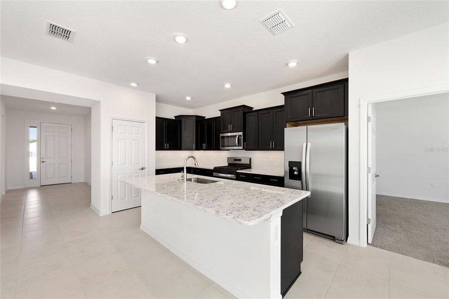 Furnished interior view inside a new home in Calesa Township, Ocala (Image 12).