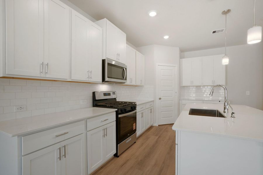 Photo is not of the actual home, but is an inspirational photo of builder’s model home and may depict options, furnishings, and/or decorator features that are not included