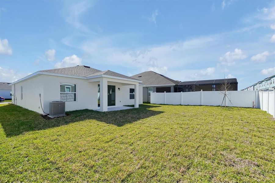 Exterior details and patio area of a home in Prairie Oaks, St. Cloud (Image 4).