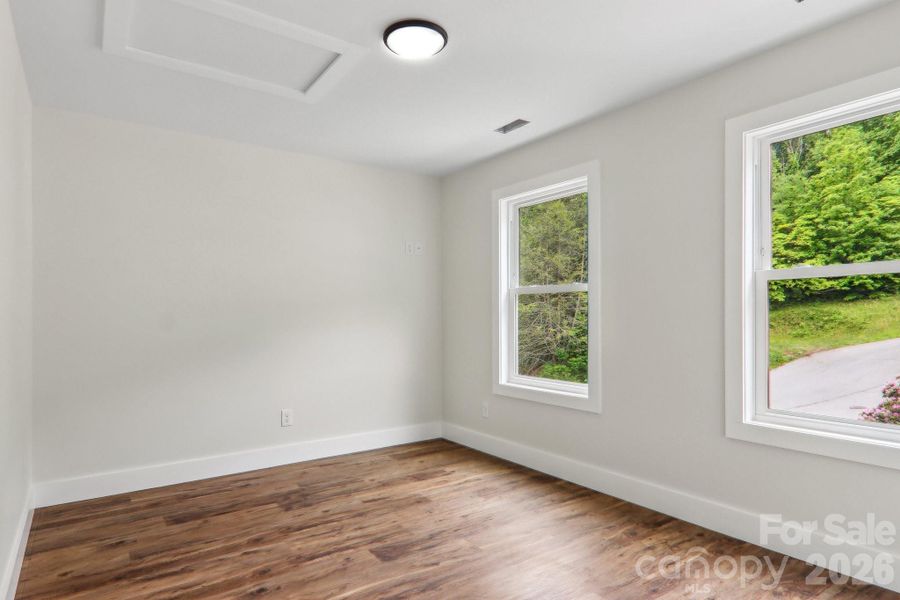Spacious, unfurnished interior of a new home in , Waynesville (Image 31).