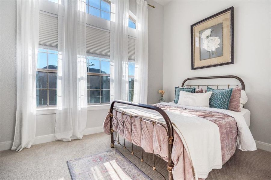 Bedroom with carpet flooring