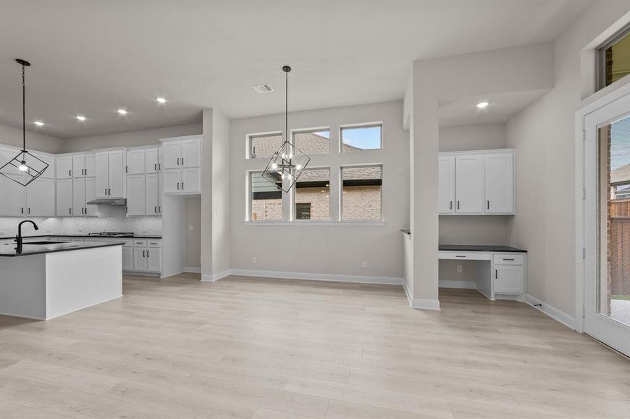 Furnished interior view inside a new home in South Pointe  Cottage Series, Mansfield (Image 5).