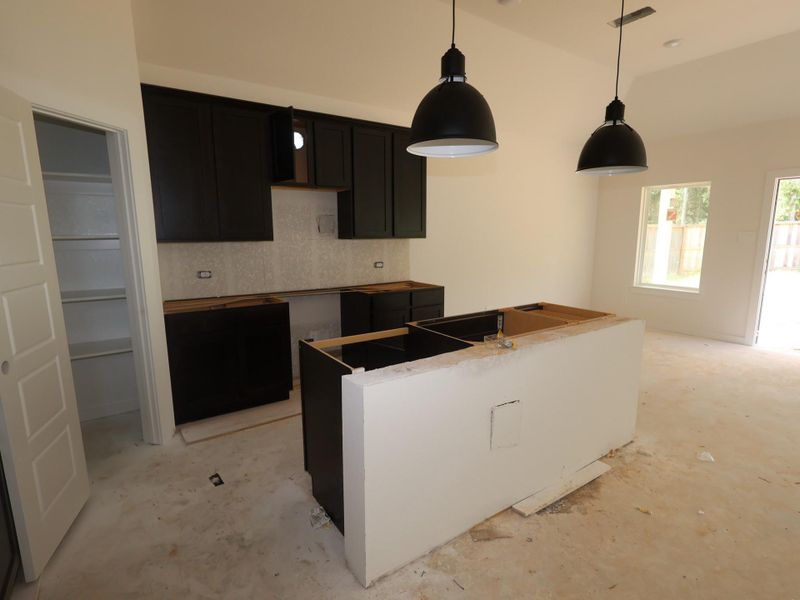Furnished interior view inside a new home in Pinewood at Grand Texas, New Caney (Image 6).