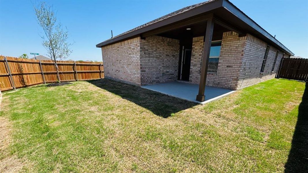 Front exterior of a new home in Meadowbrook Estates, Cleburne, TX, highlighting curb appeal (Image 20). Front exterior of a new home in Meadowbrook Estates, Cleburne, TX, highlighting curb appeal (Image 20).