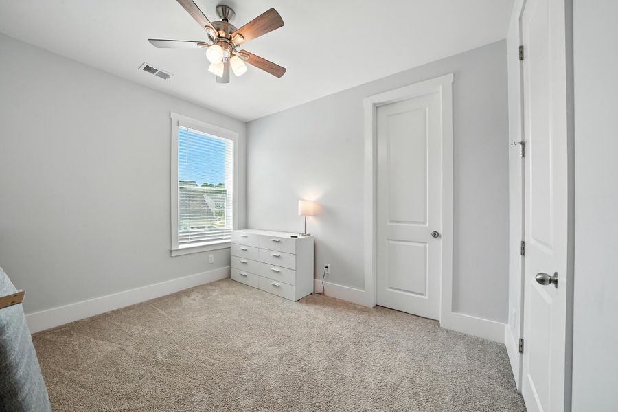 Furnished interior view inside a new home in , Ravenel (Image 38).
