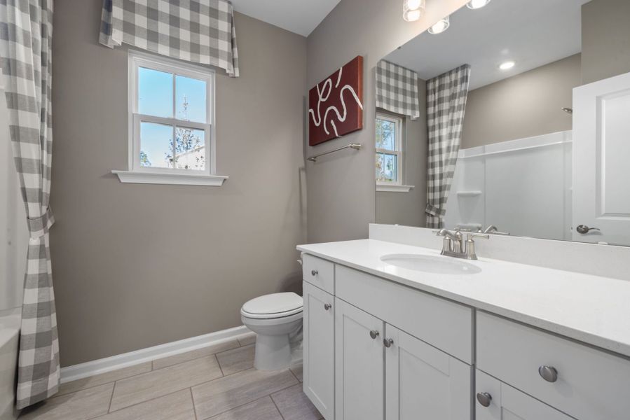 Furnished interior view inside a new home in Exchange at 401, Raleigh (Image 8).