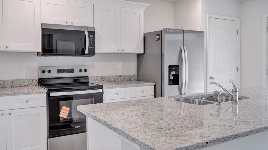 Furnished interior view inside a new home in Riggs Pointe, Millington (Image 7).