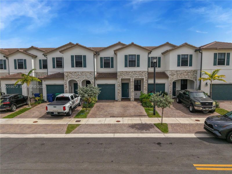 Front exterior of a new home in , Miami, FL, highlighting curb appeal (Image 23). Front exterior of a new home in , Miami, FL, highlighting curb appeal (Image 23).