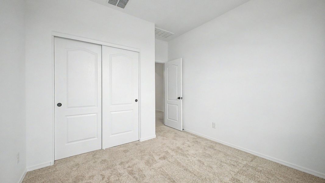 Third bedroom inside this move-in ready single-story Clover by DRB Homes at Sienna Park, 1315 S. 215th Dr., Buckeye, AZ 85326 Third bedroom inside this move-in ready single-story Clover by DRB Homes at Sienna Park, 1315 S. 215th Dr., Buckeye, AZ 85326