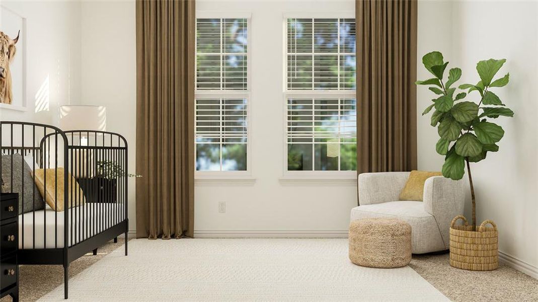 Living area featuring carpet flooring and a wealth of natural light