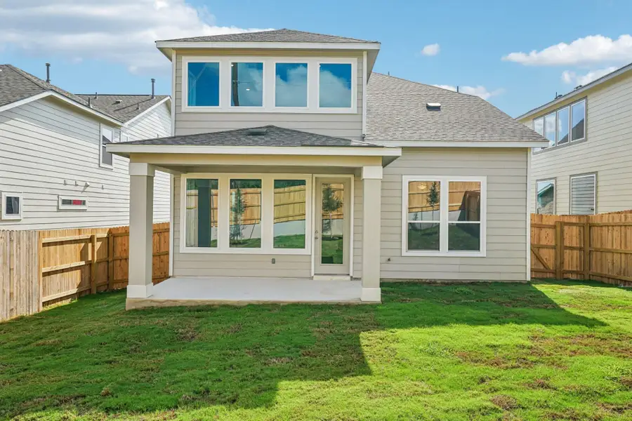 Exterior details and patio area of a home in The Meadows at Hunters Ranch, San Antonio (Image 3).