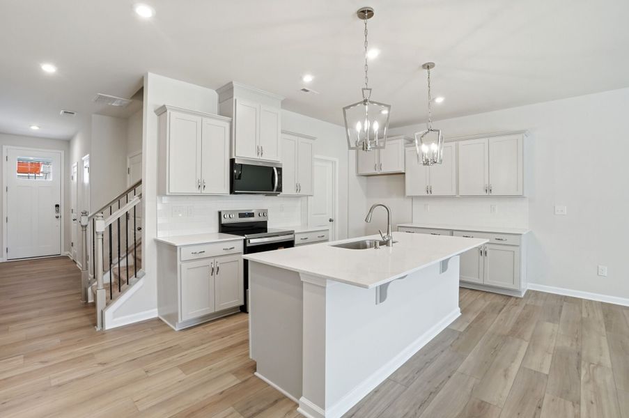 Furnished interior view inside a new home in Stonesummit at Reedy Creek, Charlotte (Image 5).