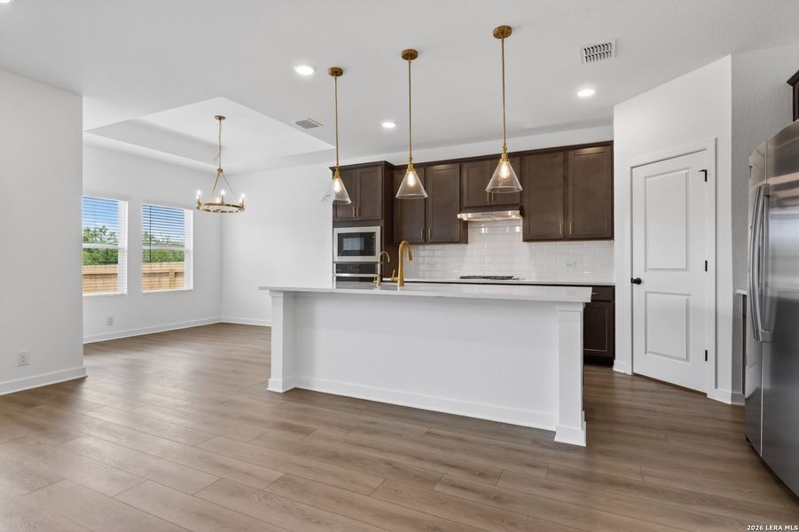 Furnished interior view inside a new home in Nopal Valley, San Antonio (Image 10).