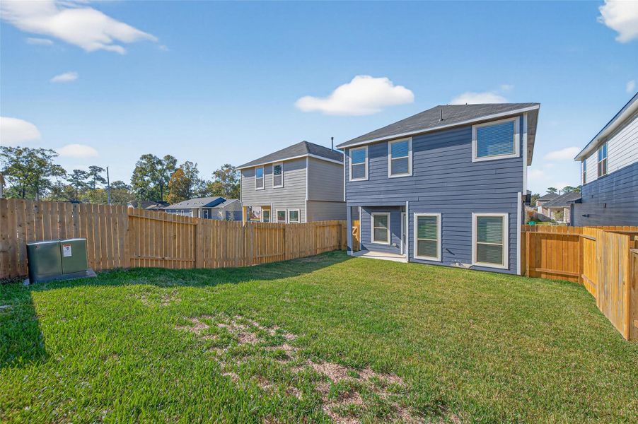 Exterior details and patio area of a home in Woodland Lakes, Houston (Image 18). Exterior details and patio area of a home in Woodland Lakes, Houston (Image 18).