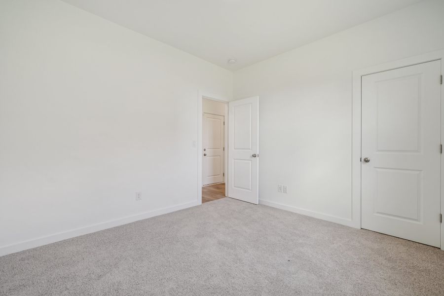 A room with white doors.