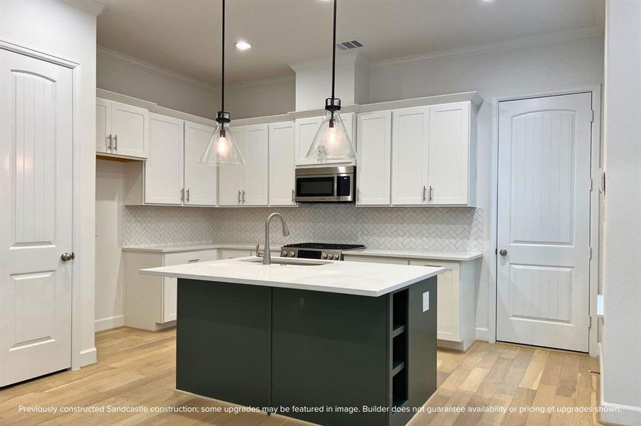 Pre-wired for pendant lights, this kitchen is ready to shine in any setting.