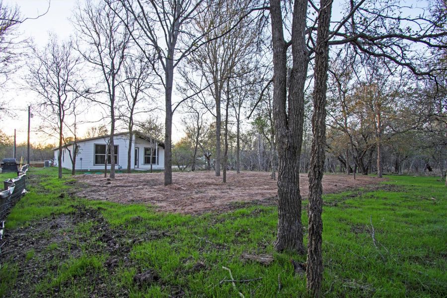Exterior details and patio area of a home in , Bastrop (Image 28).