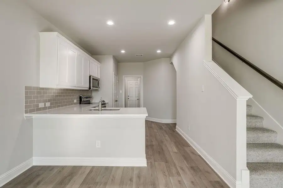 Furnished interior view inside a new home in Knight's Landing on Eden Road, Arlington (Image 9).