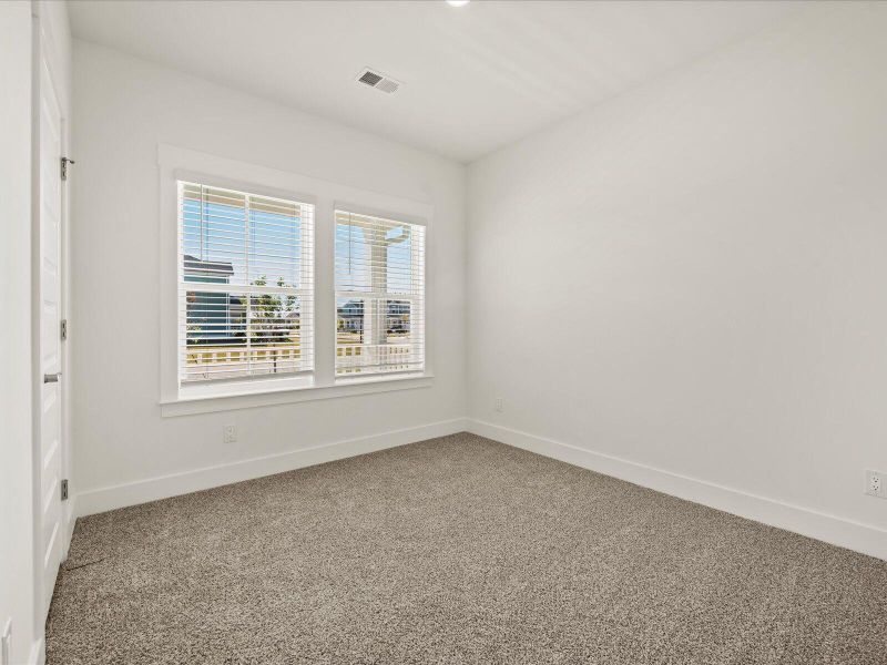 Spacious, unfurnished interior of a new home in The Coves at Lakes of Cane Bay, Summerville (Image 29). Spacious, unfurnished interior of a new home in The Coves at Lakes of Cane Bay, Summerville (Image 29).