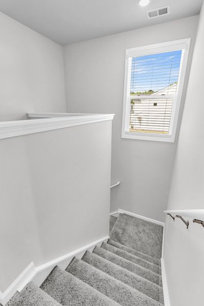 Spacious, unfurnished interior of a new home in Central Creek, Goose Creek (Image 52).