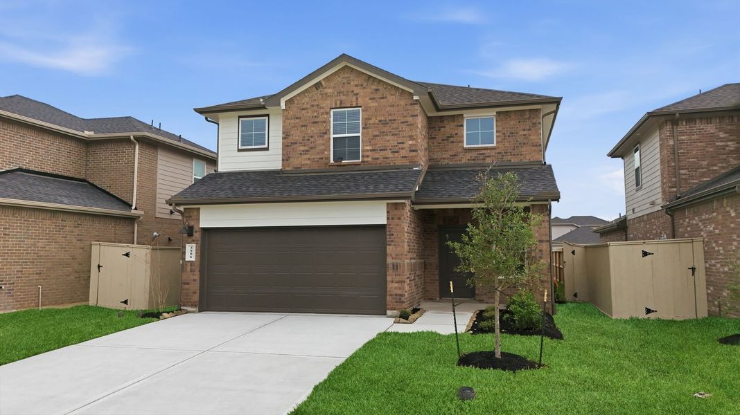 Front exterior of a new home in Caldwell Crossing, Iowa Colony, TX, highlighting curb appeal (Image 1). Front exterior of a new home in Caldwell Crossing, Iowa Colony, TX, highlighting curb appeal (Image 1).