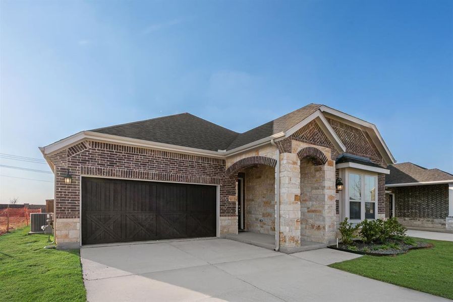 Front exterior of a new home in Arbors at Legacy Hills, Celina, TX, highlighting curb appeal (Image 21). Front exterior of a new home in Arbors at Legacy Hills, Celina, TX, highlighting curb appeal (Image 21).