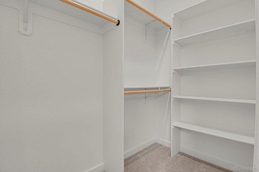 Upper level walk-in closet Upper level walk-in closet