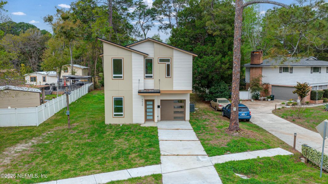 Front exterior of a new home in , Jacksonville, FL, highlighting curb appeal (Image 2). Front exterior of a new home in , Jacksonville, FL, highlighting curb appeal (Image 2).
