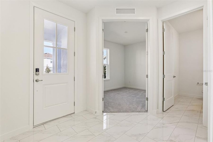 Furnished interior view inside a new home in Trinity Place, St. Cloud (Image 12).