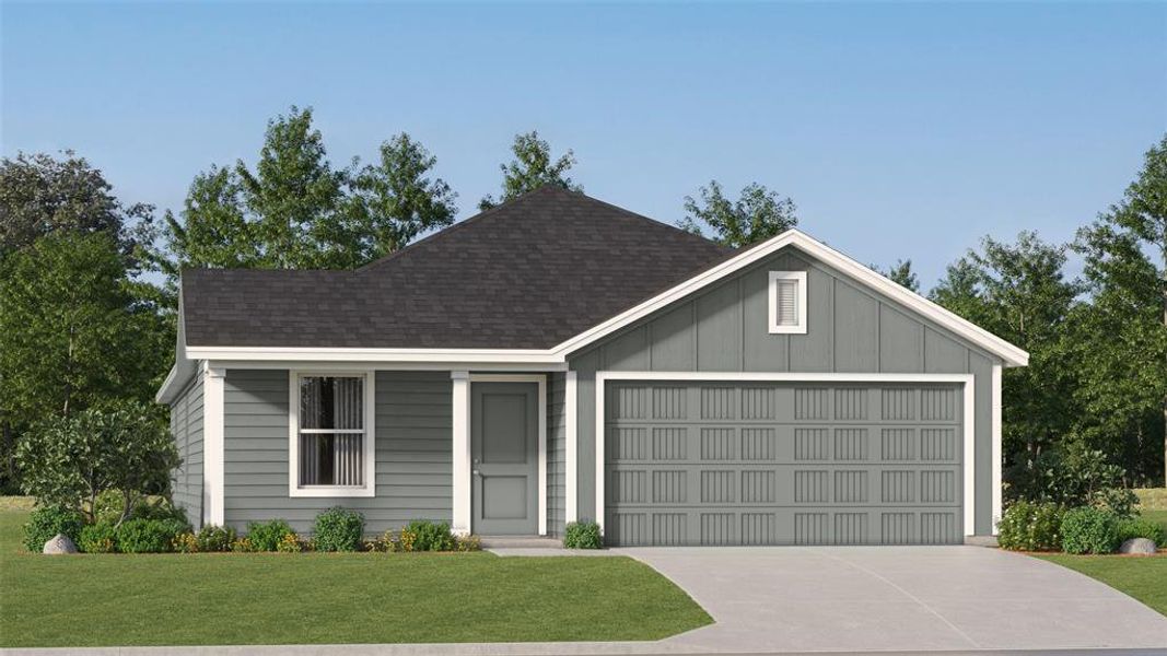 View of front facade with a garage and a front yard