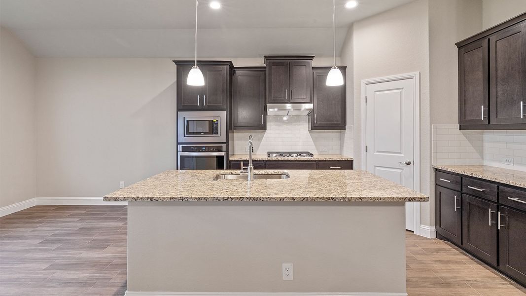 Representative furnished interior of a home built from the Odessa by D.R. Horton in Lakeview Pointe, Grand Prairie (Image 7).