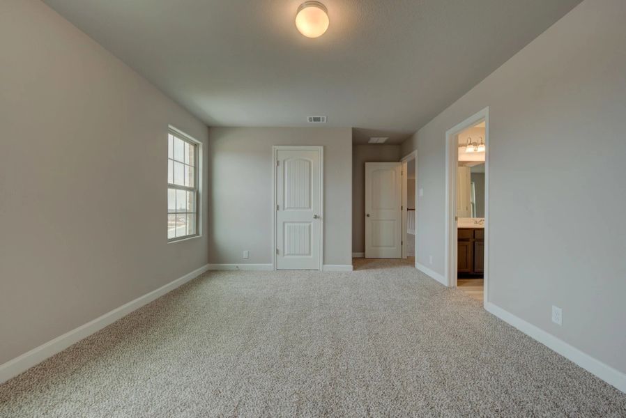 Representative unfurnished interior of a home built from the Cleburne by Ashton Woods in Mustang Oaks, San Antonio (Image 38).