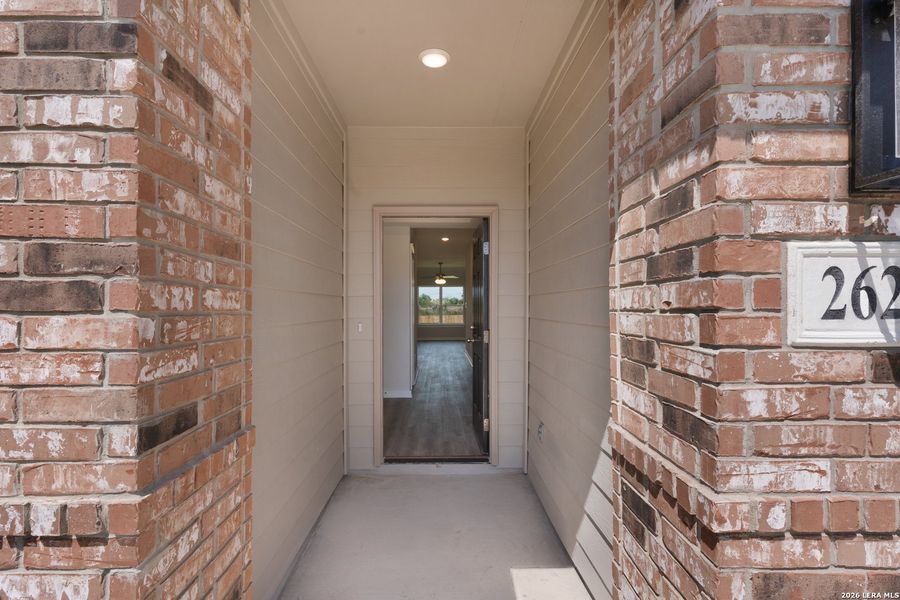 Exterior details and patio area of a home in Prairie Green, Converse (Image 3).