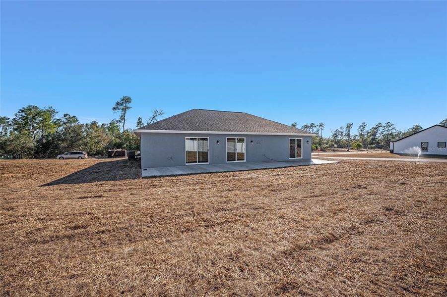 Exterior details and patio area of a home in , Ocklawaha (Image 3).
