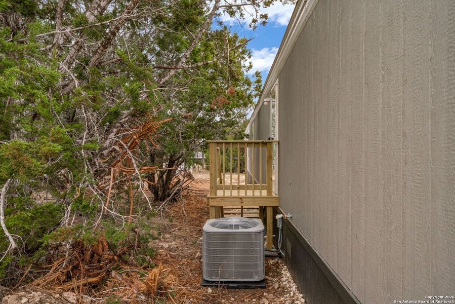 Exterior details and patio area of a home in , Bandera (Image 17).