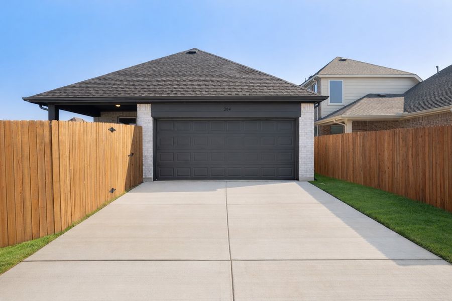 Front exterior of a new home in Edgewater, Fate, TX, highlighting curb appeal (Image 22).