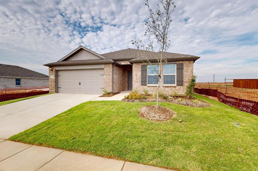 Exterior details and patio area of a home in Mobberly Farms, Pilot Point (Image 19). Exterior details and patio area of a home in Mobberly Farms, Pilot Point (Image 19).