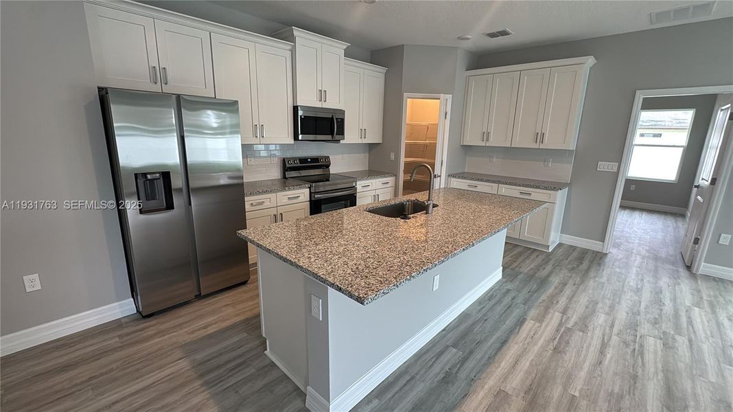 Furnished interior view inside a new home in , Summerfield (Image 5). Furnished interior view inside a new home in , Summerfield (Image 5).