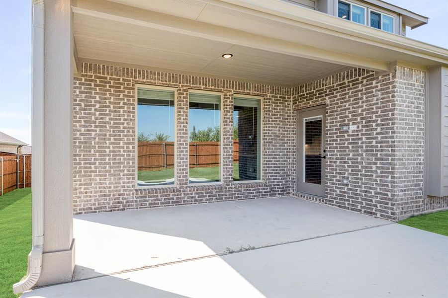 Exterior details and patio area of a home in The Grove, Midlothian (Image 18).