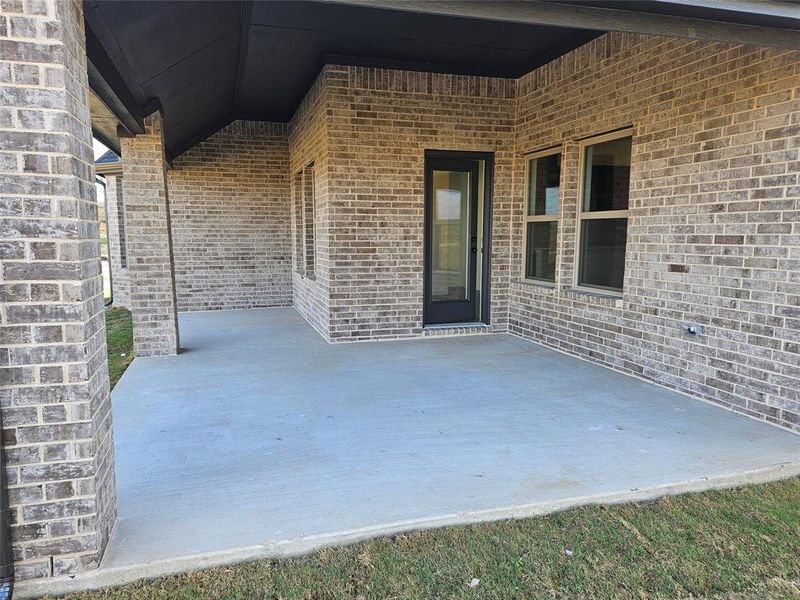 Exterior details and patio area of a home in Corner Stone Ranch, Howe (Image 3).