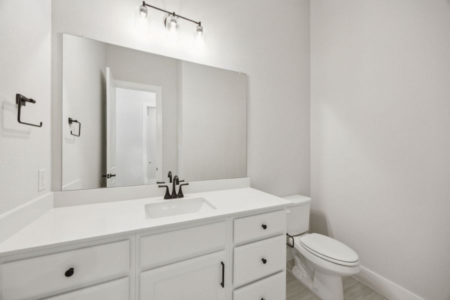 Furnished interior view inside a new home in Newman Village Townhomes, Frisco (Image 8).