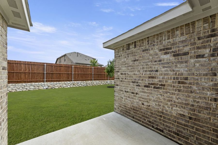 Representative exterior photo of a completed home built from the Boston by Impression Homes in Northspur, Terrell, TX (Image 27). Representative exterior photo of a completed home built from the Boston by Impression Homes in Northspur, Terrell, TX (Image 27).